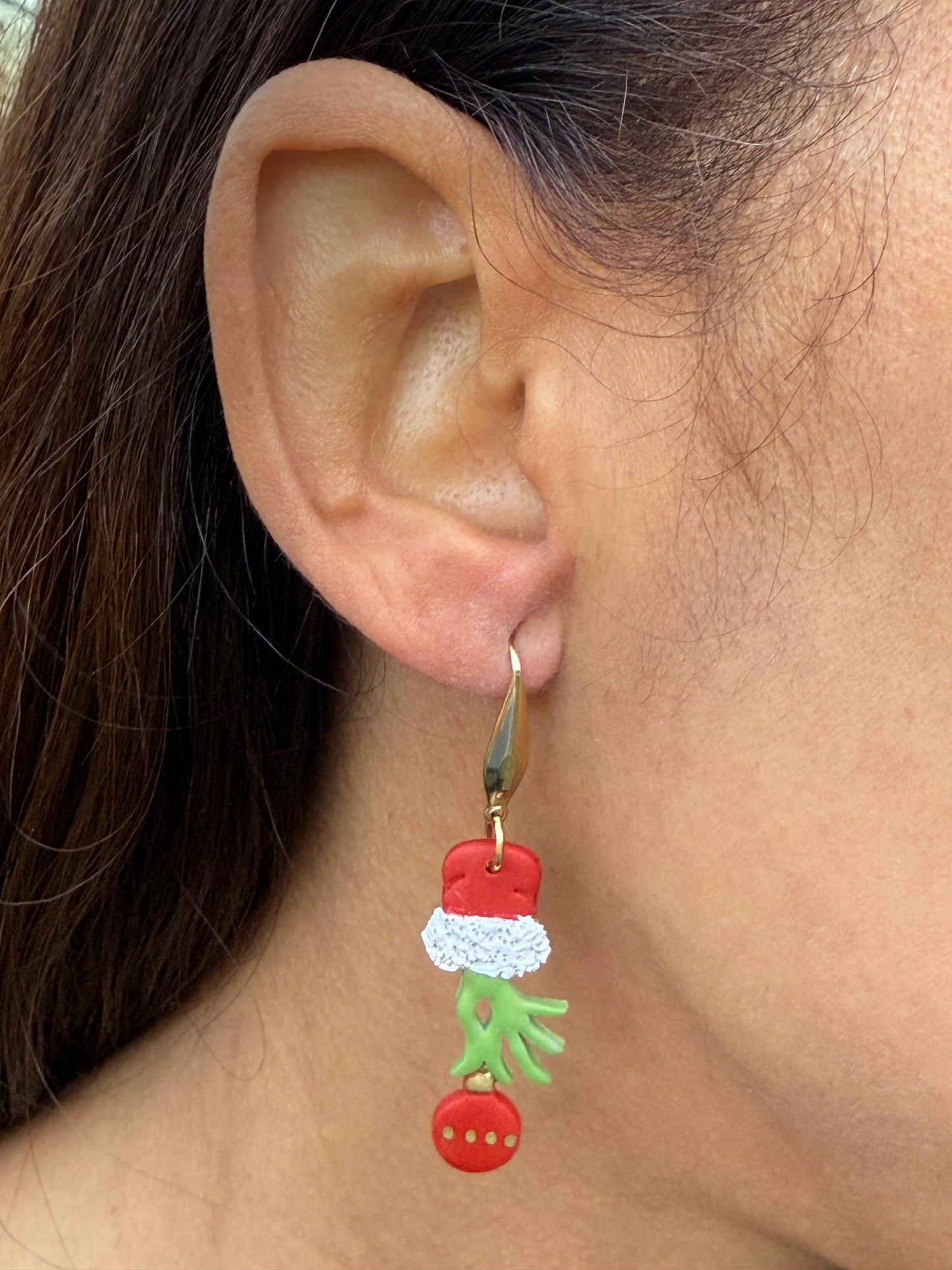 Grinch Hand with Holiday Ornament