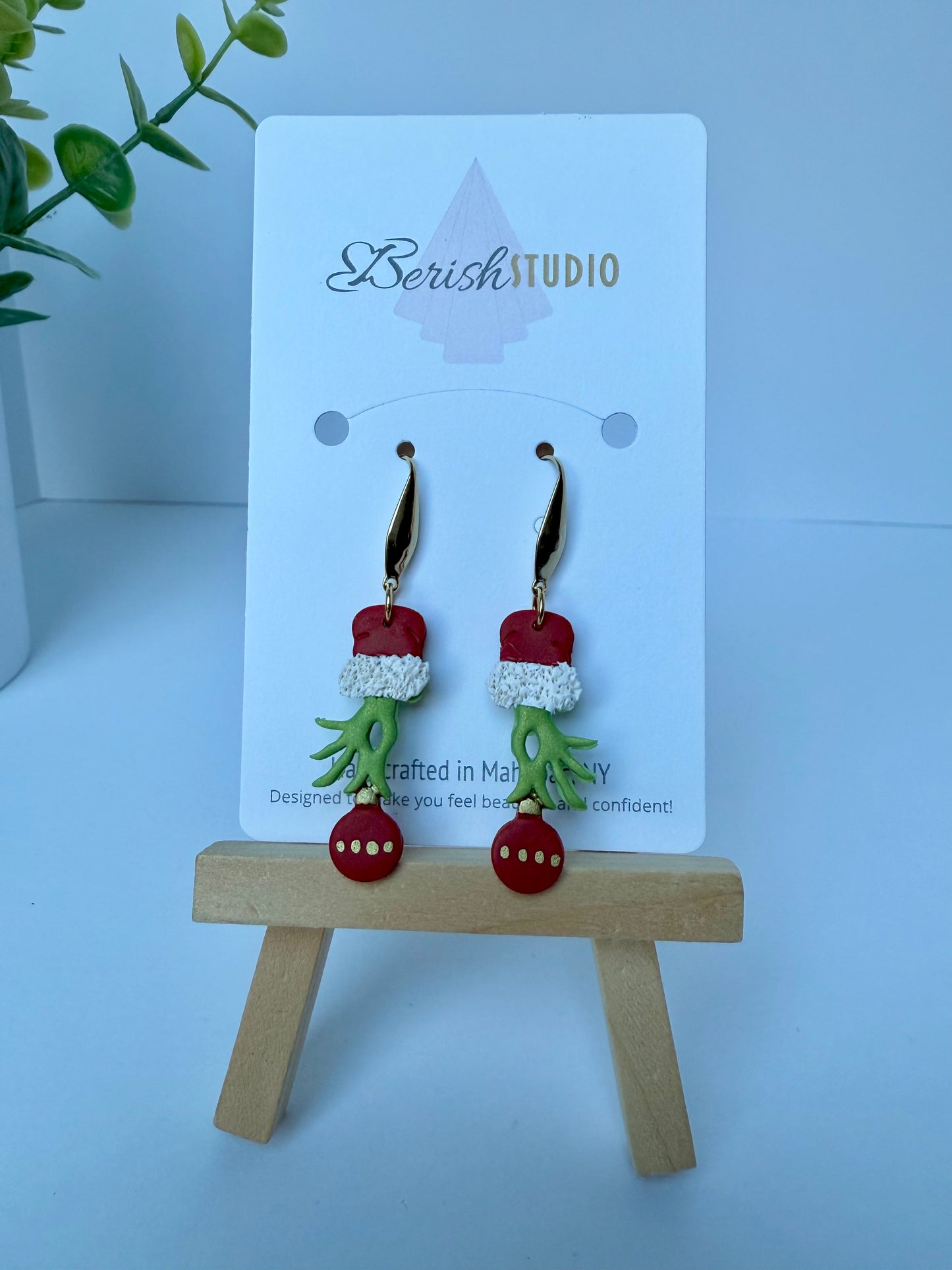 Grinch Hand with Holiday Ornament